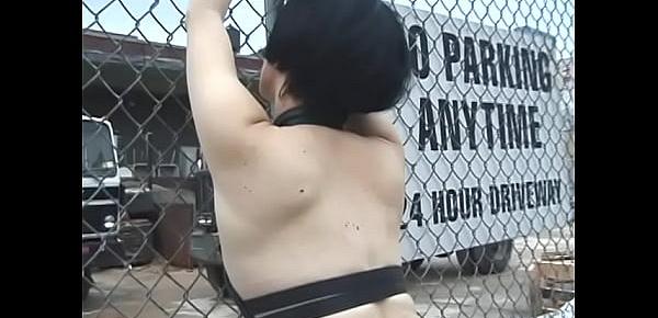  Hot bitch with red hair attaches a brunette to the fence and punished her with clothespins